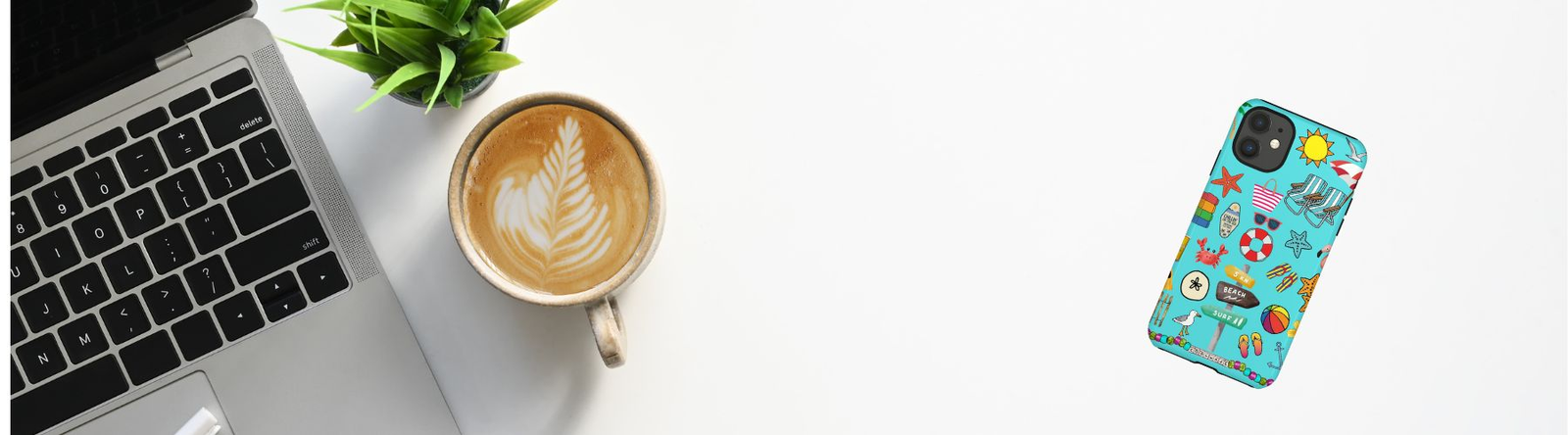 Beachy Phone Cases shows a desk with a laptop and a beachy iphone case in teal with beachy images on it.  Phone cases are available for iPhones and Samsungs.